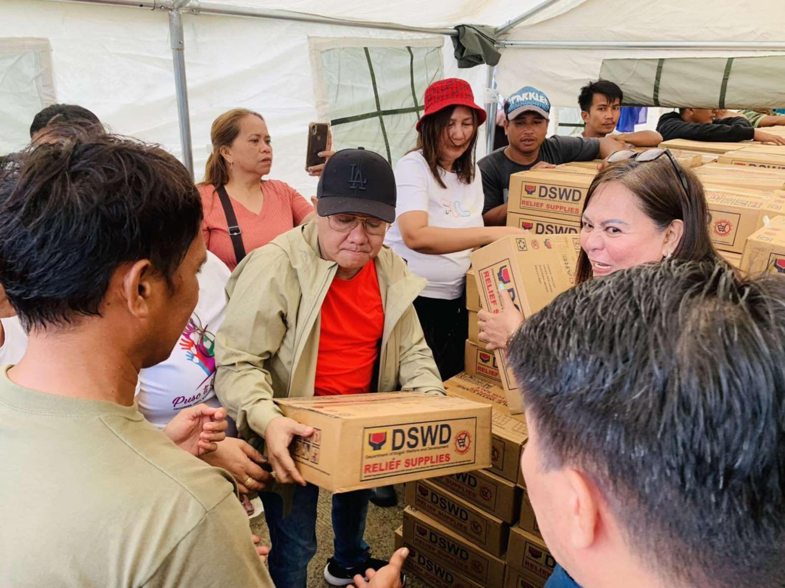 Almost 2,000 families in Narvacan receive relief post-Carina